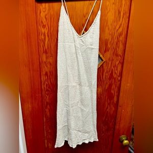Small/medium dress, made in Bali, think it’s by Bahgoose